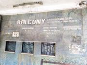 Ticket counter for a balcony at Alankar Cinema in Pune.