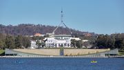 Old and new Parliament Houses in Canberra, Australia represent the location of regulatory decisions about technology.