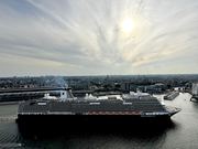 Holland America Line cruise ship viewed from A'DAM Tower, illustrating a recent data breach.