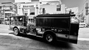 The Dolby Theatre and a fire engine are visible in Hollywood, relating to discussions around AI authorship.