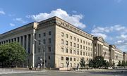 The Herbert C. Hoover Building in Washington, D.C., is featured in reporting on artificial intelligence.