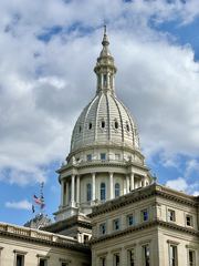 The dome of the Michigan State Capitol building in Lansing, relevant to political news.