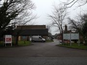 A care home building is pictured, relating to a report by the Social Care Commission.