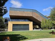 Stanford University buildings are shown in a scene related to artificial intelligence research.